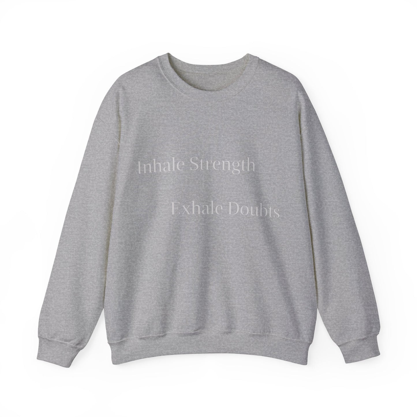 A comfortable gray sweatshirt laid flat with the phrase "Inhale Strength Exhale Doubt" printed in the center in subtle, light gray text by Printify.